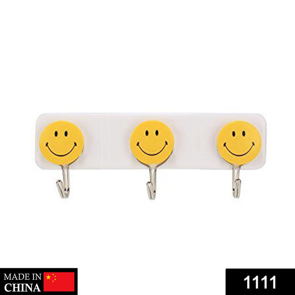 Cute smiley wall hooks with adhesive backing.